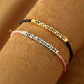 Hard Days bracelet in black and gold, worn
